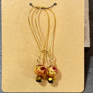 Large Gold Tone Oval Hoop Earrings with Red & Gold Colored Beads